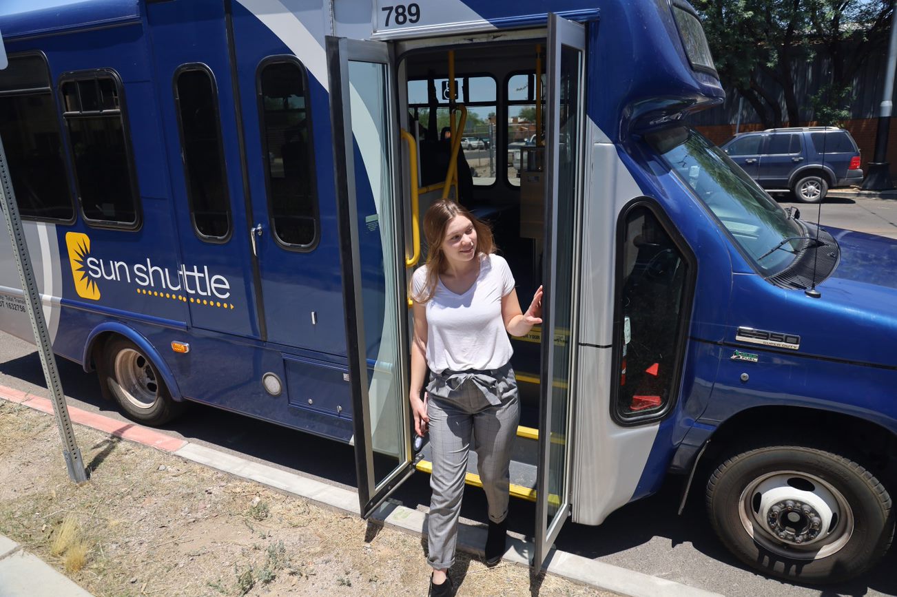 Women getting off bus